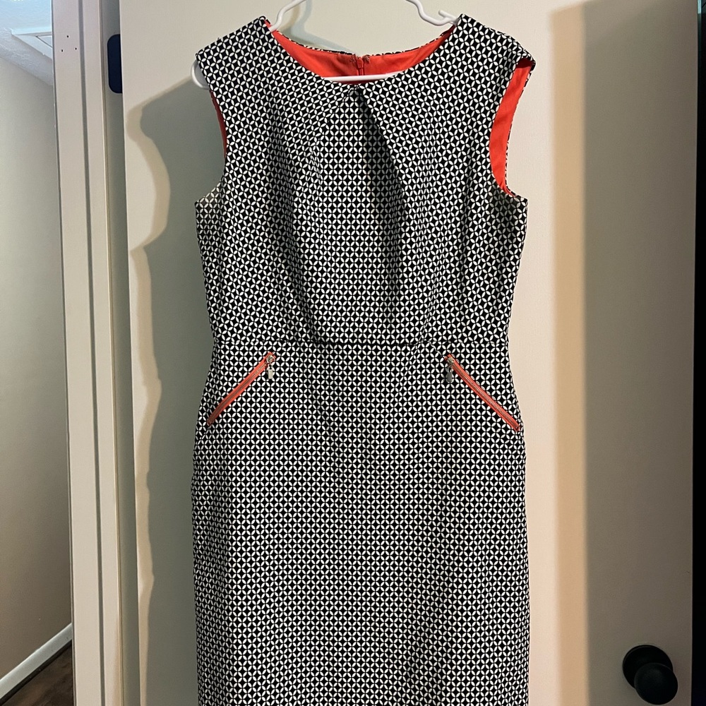 Sandra Darren black print dress in size 12. Nice pops of orange.